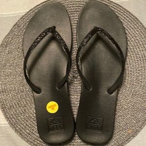 Size 10 Reef super cute sparkly black flip flops